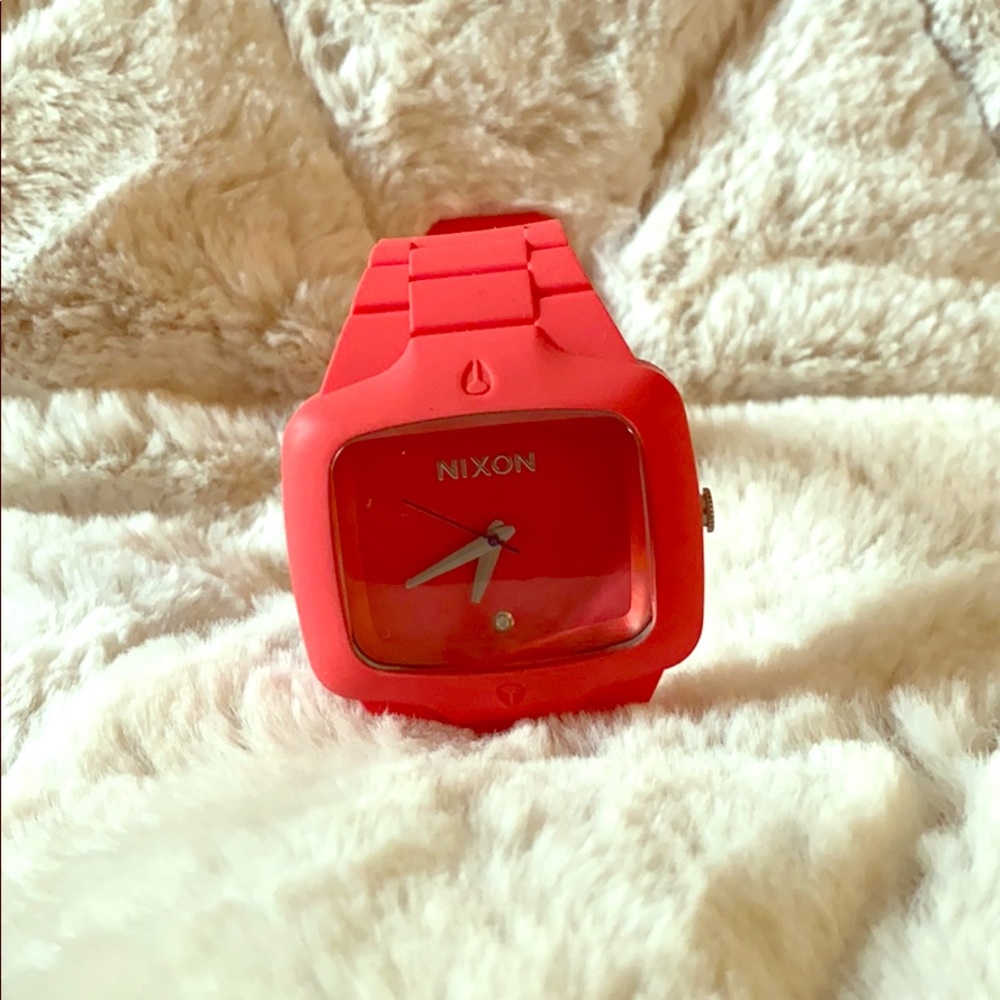Nixon women’s watch with small diamond